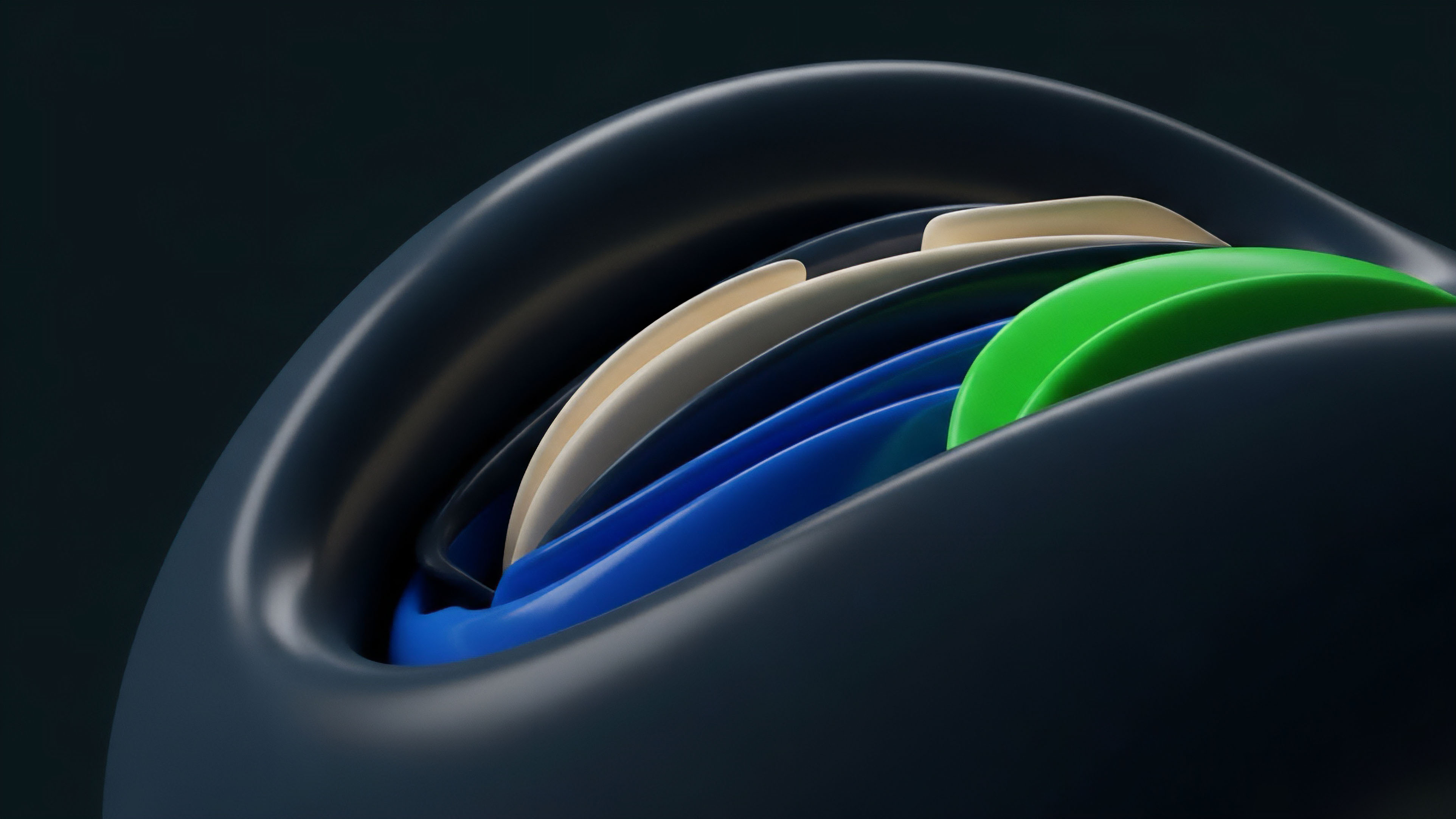 A close-up view shows smooth, dark, undulating forms containing inner layers of varying colors. The layers transition from cream and dark tones to vivid blue and green, creating a sense of dynamic depth and structured composition
