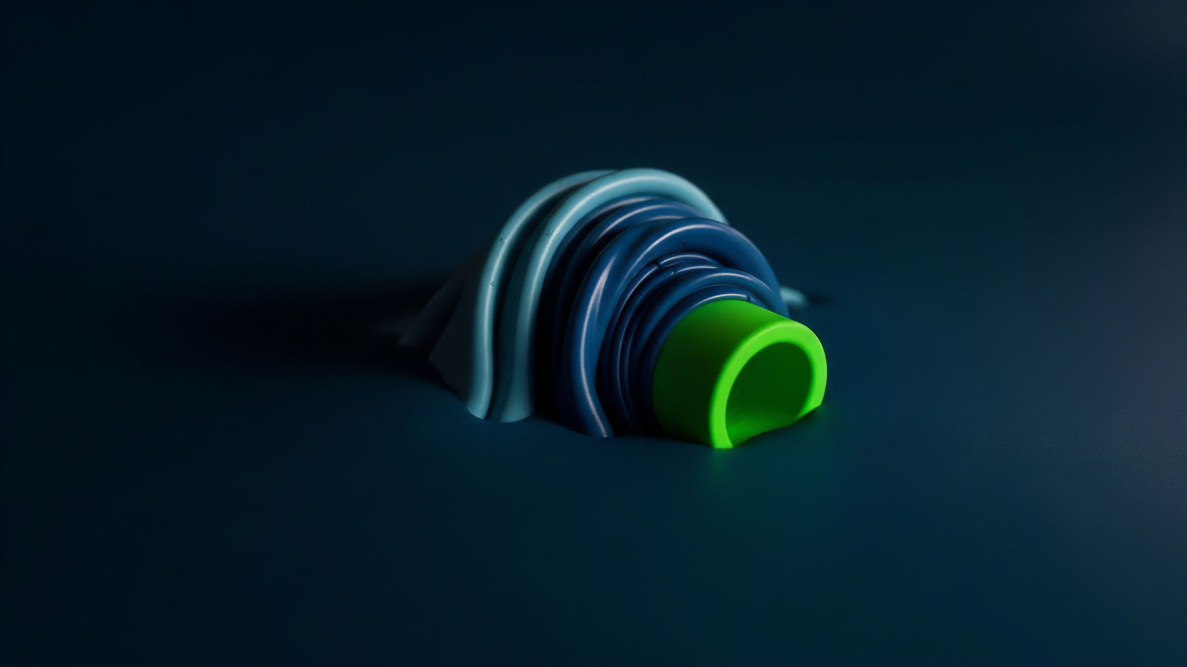 A visual representation of layered protocol architecture in decentralized finance. The varying colors represent distinct layers: dark blue as Layer 1 base protocol, lighter blue as Layer 2 scaling solutions, and the bright green as a specific wrapped digital asset or tokenized derivative. This structure visualizes complex smart contract logic and the intricate interplay required for cross-chain interoperability and collateralized debt positions in a liquidity pool environment.