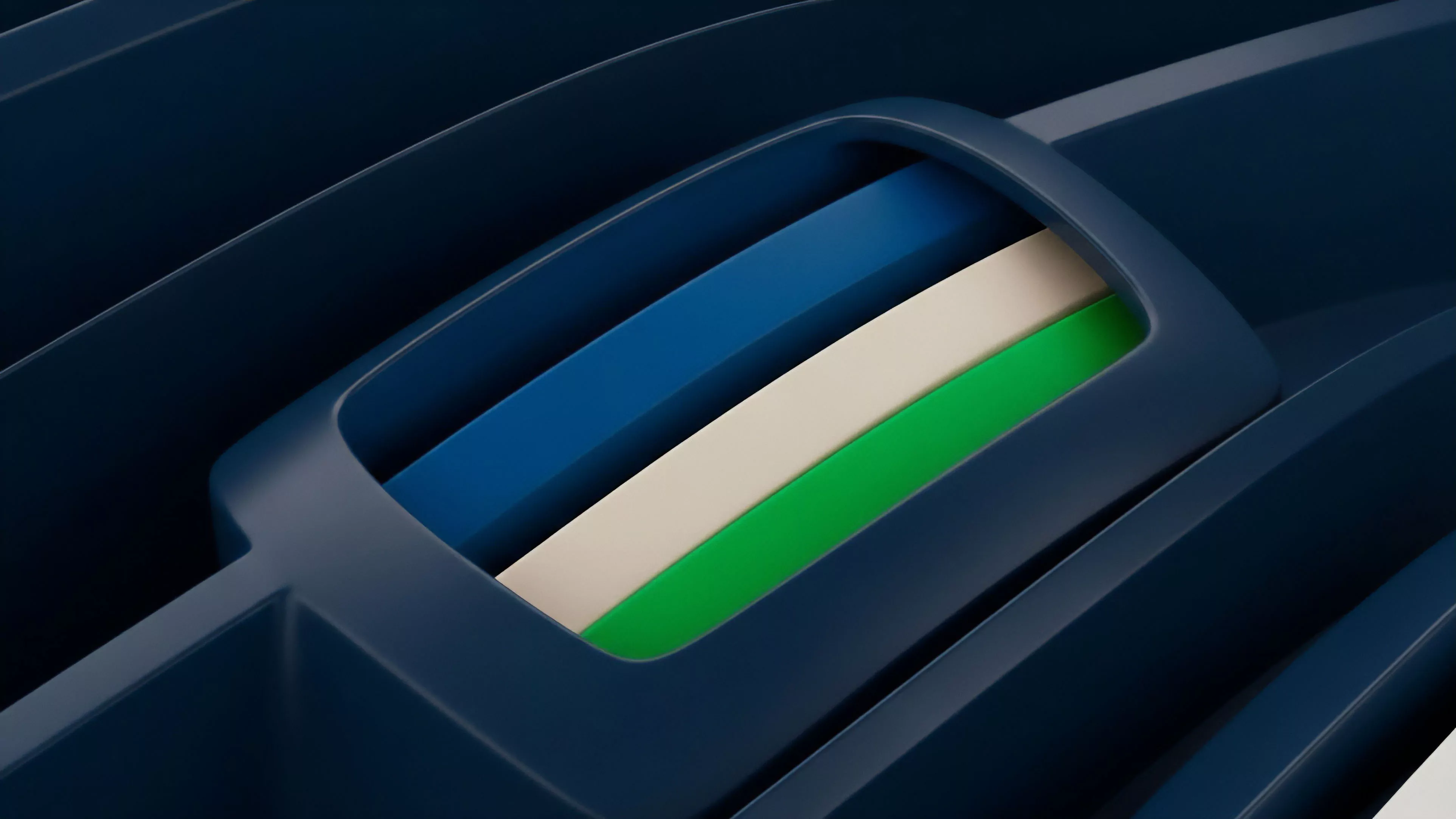 A close-up view of a dark blue, flowing structure frames three vibrant layers: blue, off-white, and green.