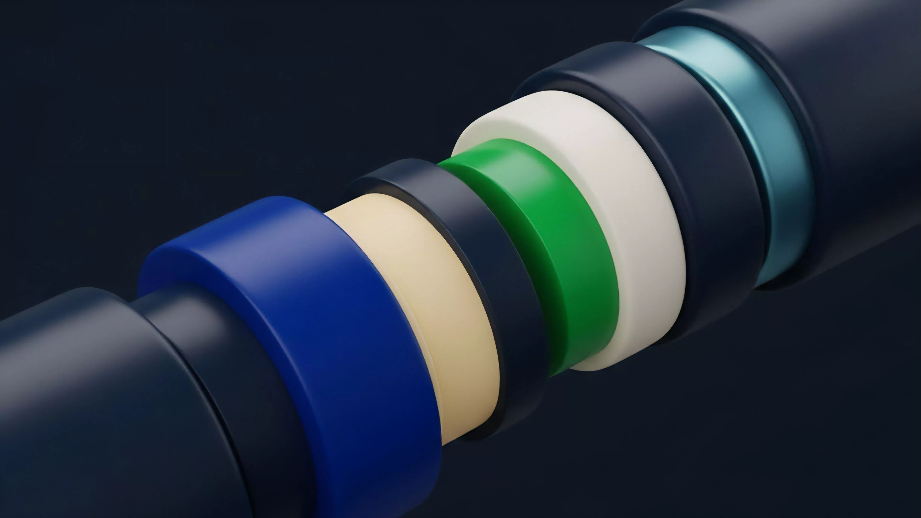 A detailed cross-section reveals concentric layers of varied colors separating from a central structure.