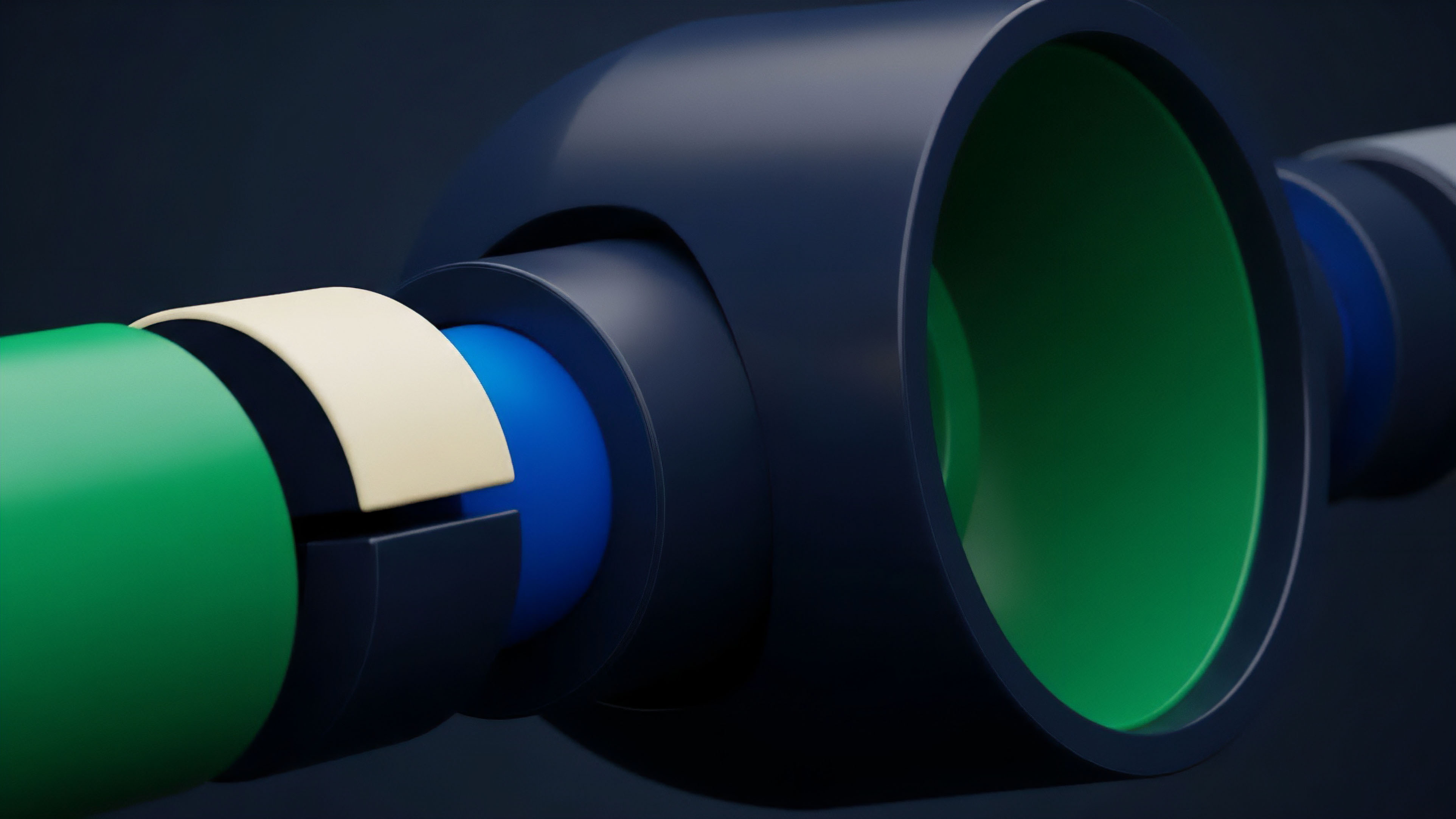 A close-up shot focuses on the junction of several cylindrical components, revealing a cross-section of a high-tech assembly. The components feature distinct colors green cream blue and dark blue indicating a multi-layered structure
