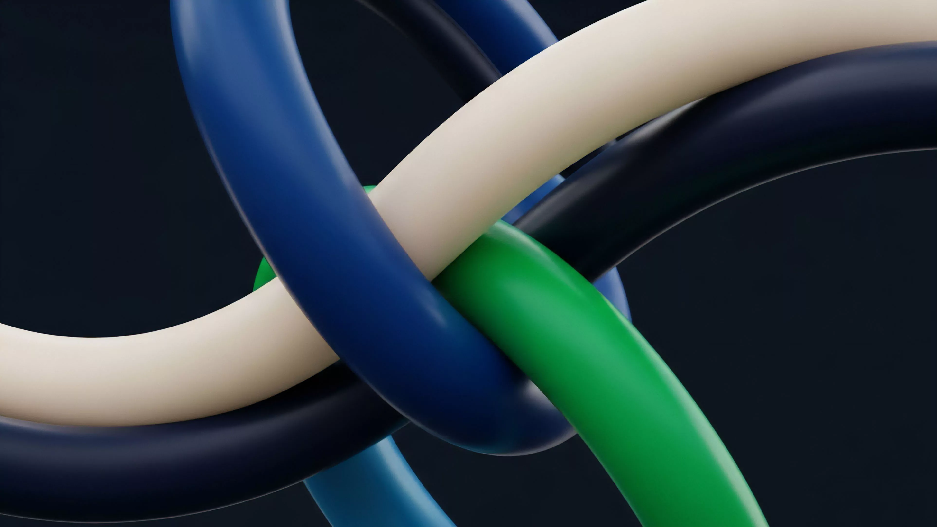 A close-up view presents four thick, continuous strands intertwined in a complex knot against a dark background. The strands are colored off-white, dark blue, bright blue, and green, creating a dense pattern of overlaps and underlaps