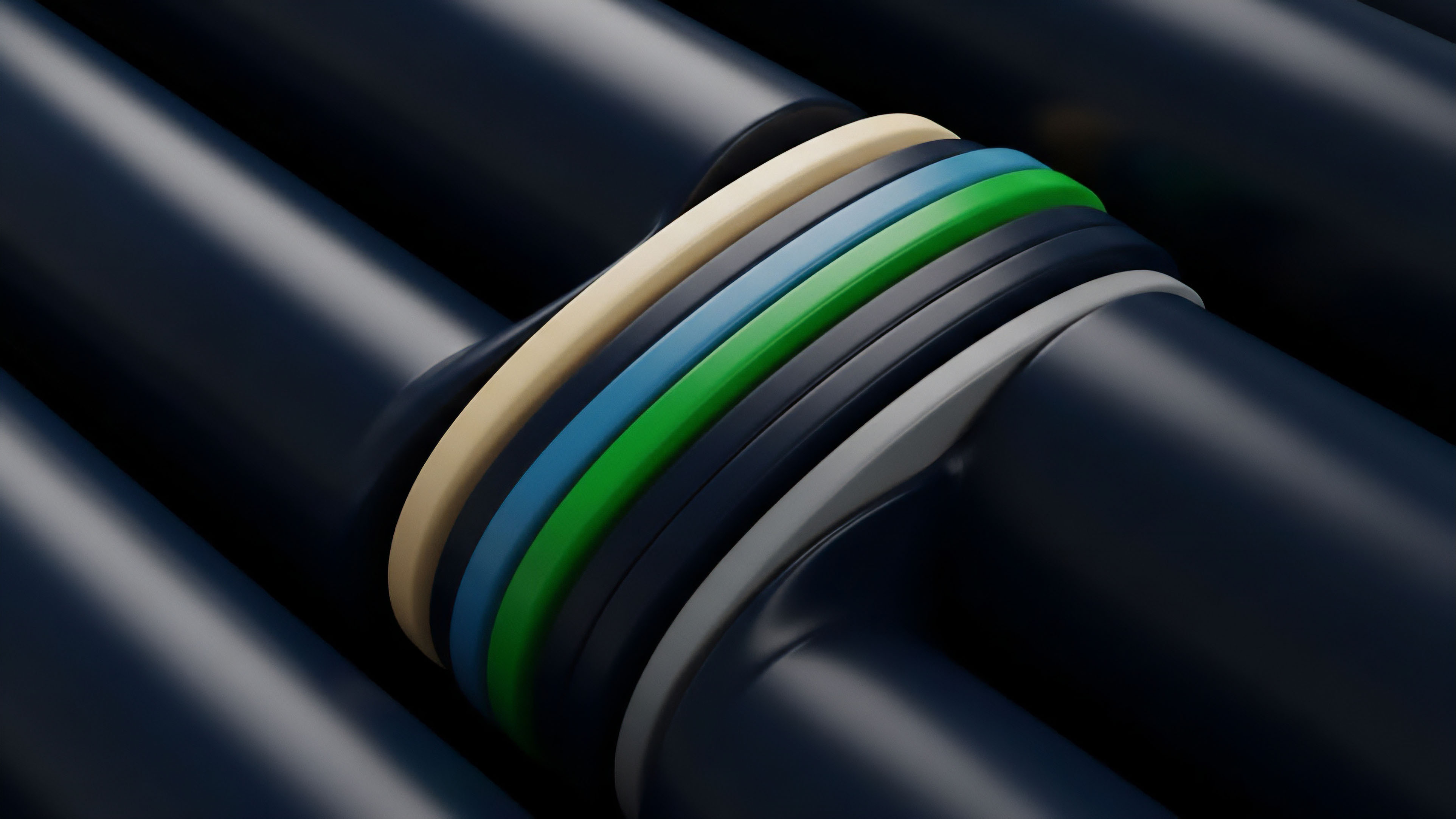 This abstract image features several multi-colored bands ⎊ including beige, green, and blue ⎊ intertwined around a series of large, dark, flowing cylindrical shapes. The composition creates a sense of layered complexity and dynamic movement, symbolizing intricate financial structures