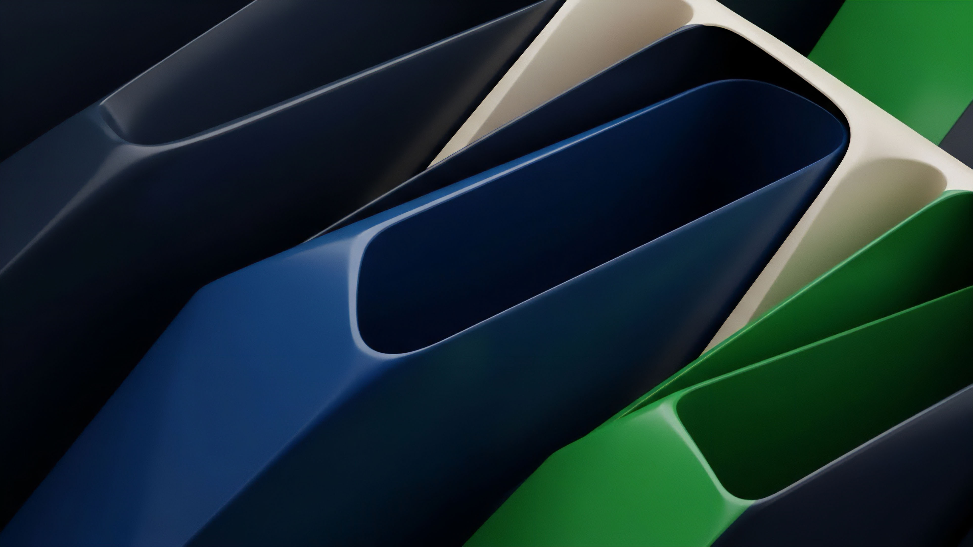 A macro abstract image captures the smooth, layered composition of overlapping forms in deep blue, vibrant green, and beige tones. The objects display gentle transitions between colors and light reflections, creating a sense of dynamic depth and complexity